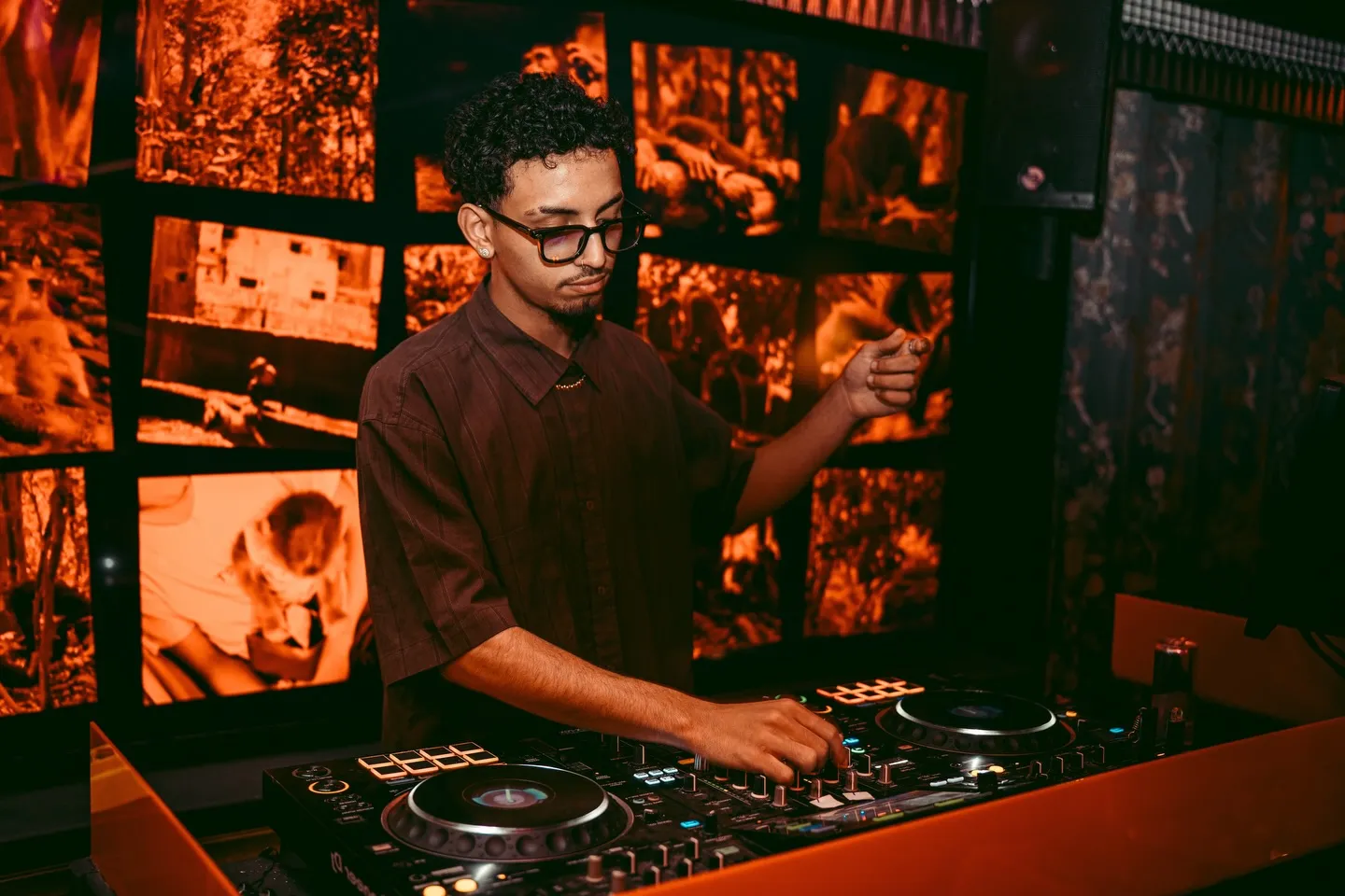 DJ playing at the booth during a night at LOV